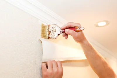 Pose de papier peint à Vuillafans — revêtements muraux et toiles de verre